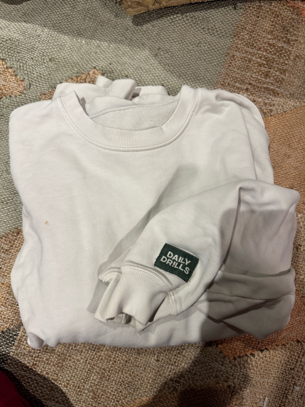 Daily Drills White Sweatshirt with Green Logo Patch